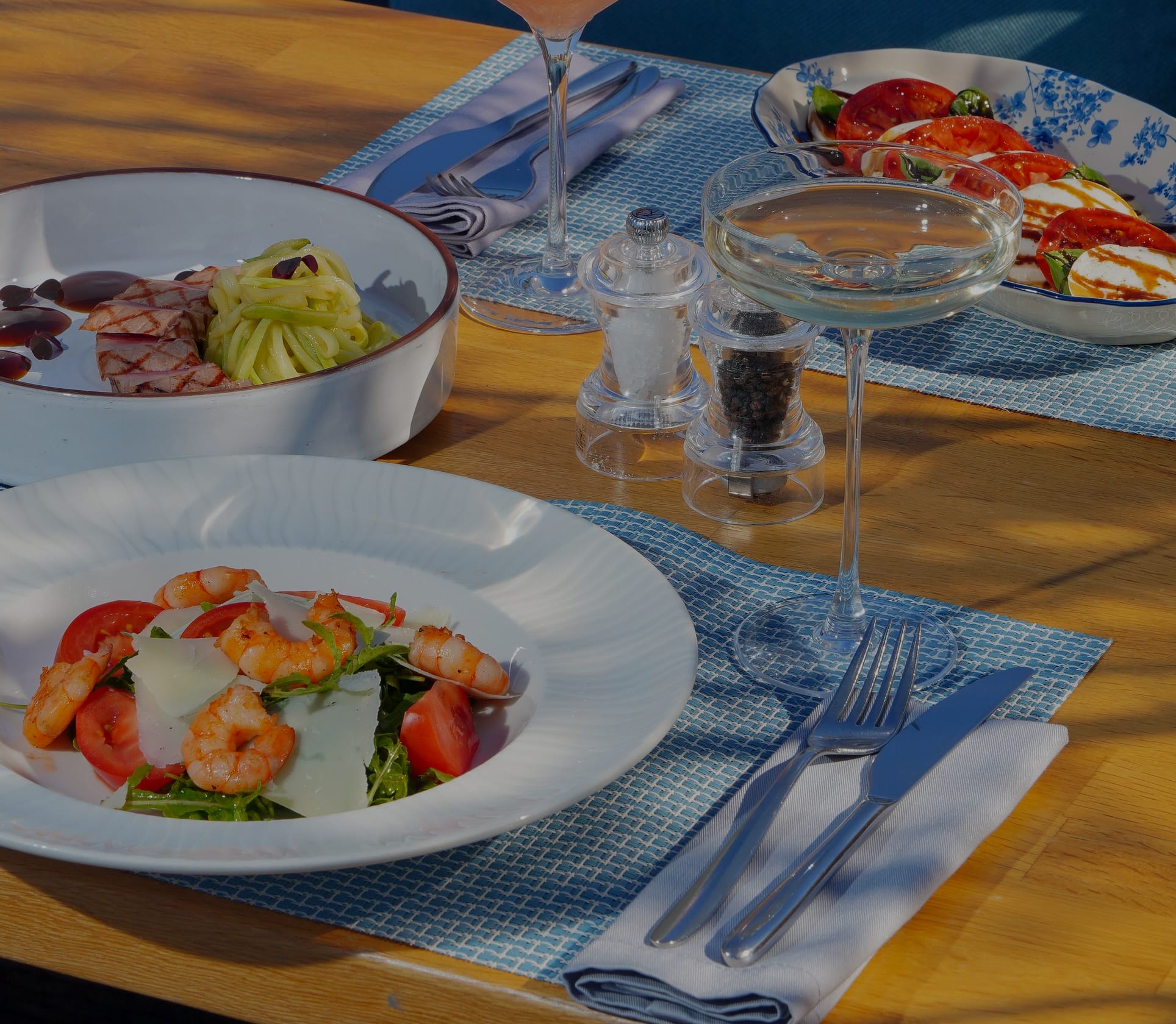 Plates of food on a restaurant table